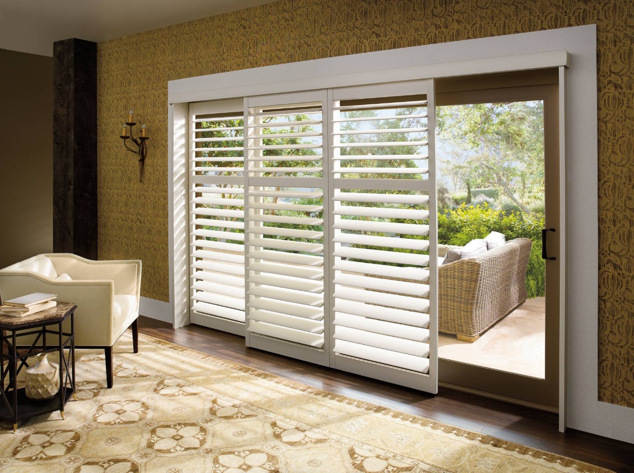 Hunter Douglas shutters filtering in light during the day at a home near Venice, FL